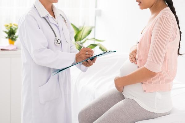OBGYN billing specialists reviewing patient charts