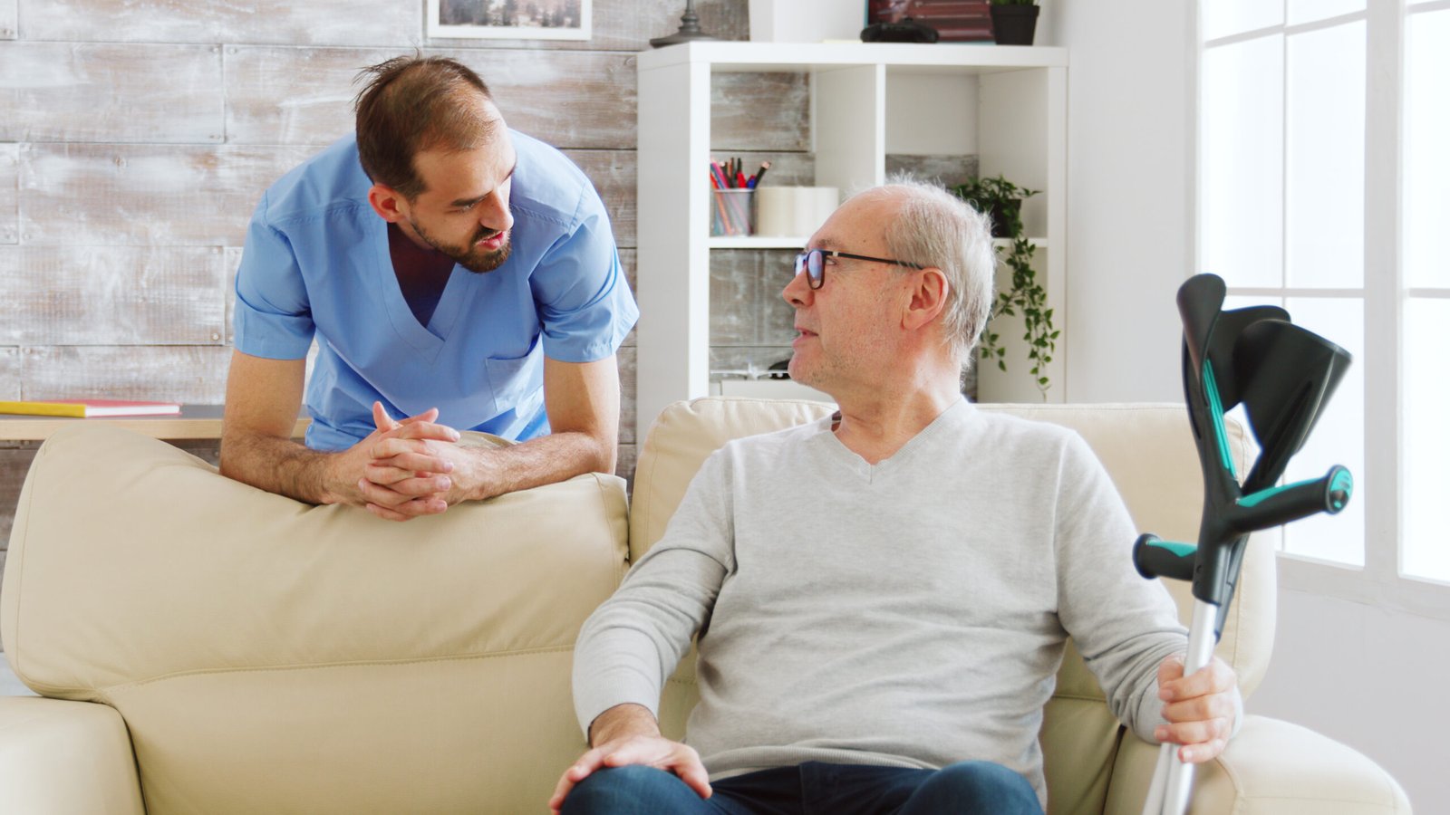 Caregiver supporting a resident in an assisted living community